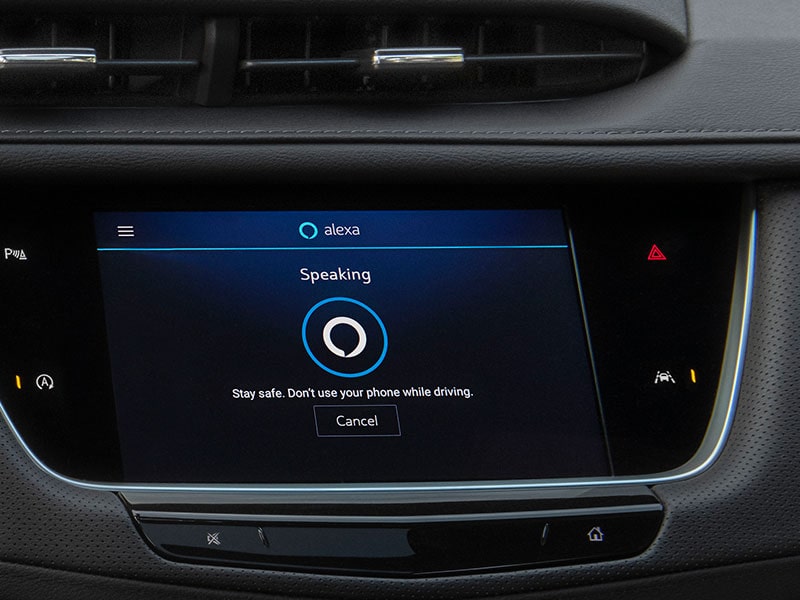 Alexa Built-In feature being displayed in the infotainment screen of the 2025 Cadillac XT6 mid-size 7 passenger SUV.