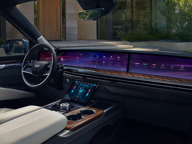 Front passenger's view of the 55" Infotainment display inside the 2025 Cadillac Escalade.