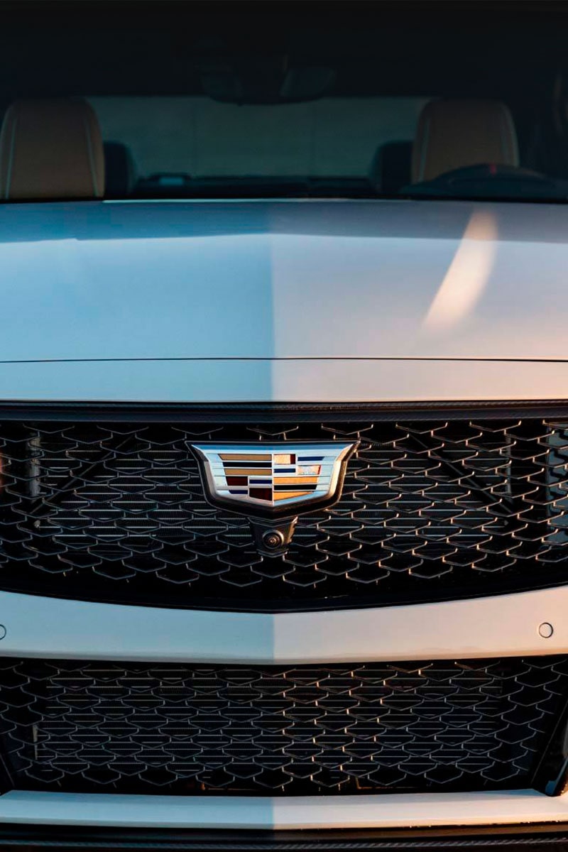 Front view of a Cadillac sedan.