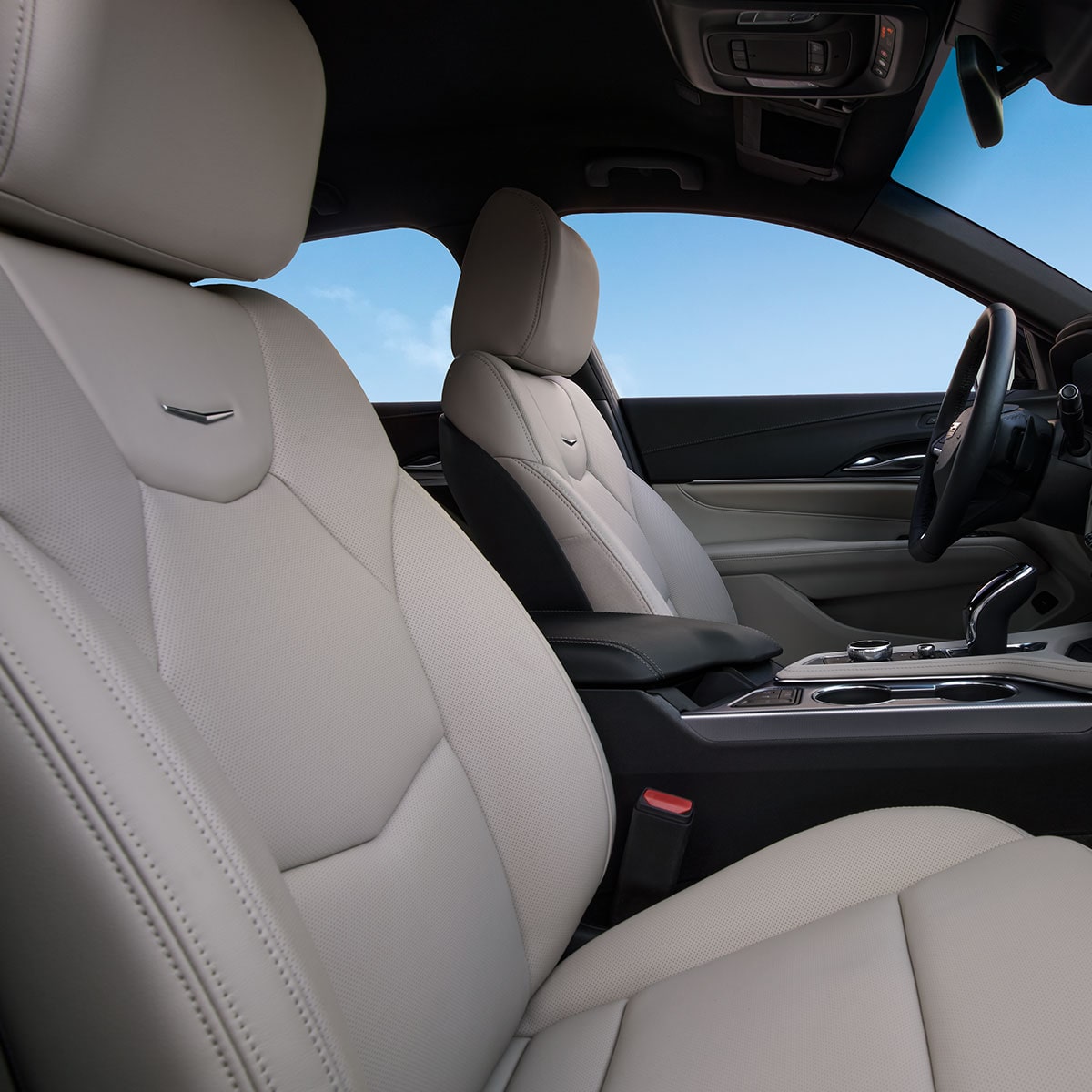 White seating interiors on the 2025 Cadillac CT4 luxury sedan.