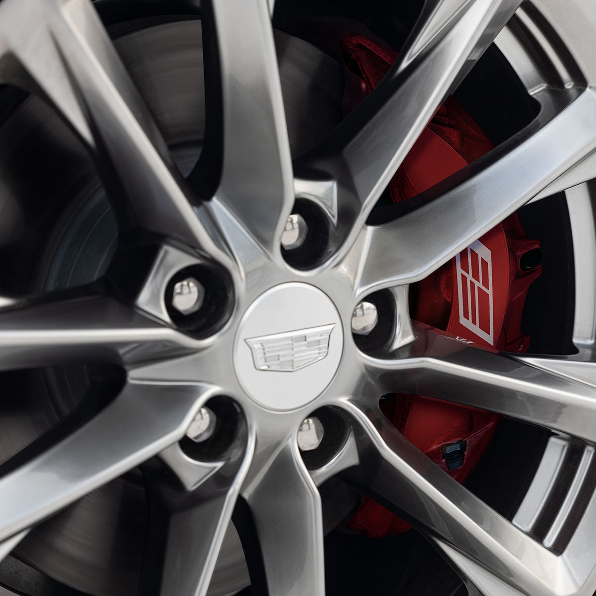 Close up view of the premium alloy wheels on the 2025 Cadillac CT4 luxury sedan.