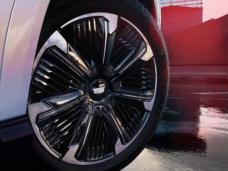 Close up view of the large 24" wheels on the 2025 Cadillac Escalade IQ electric suv. 