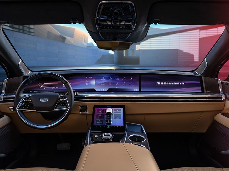 Rear passenger's view of the curved LED display on the 2025 Cadillac Escalade IQ electric suv.