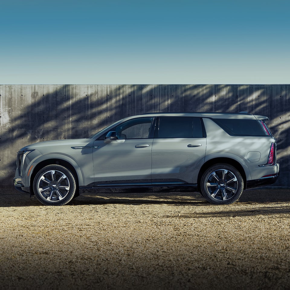 Side view of the 2026 Cadillac Escalade IQL parked outdoors.