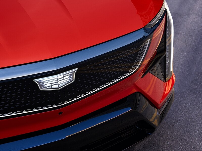 Cadillac insignia on the grille of the 2025 OPTIQ.