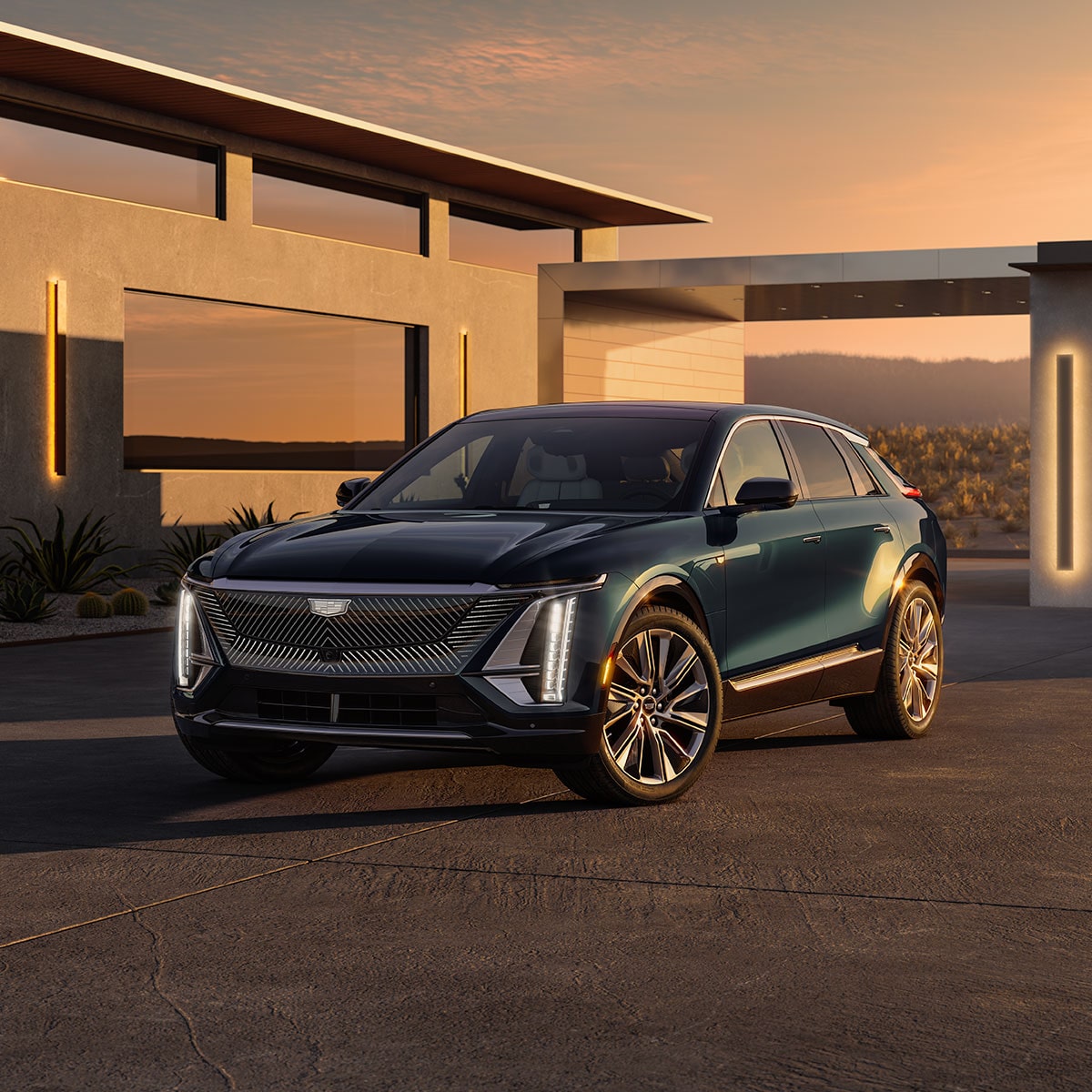 Scenic view of the 2024 Cadillac LYRIQ parked outside a home garage.